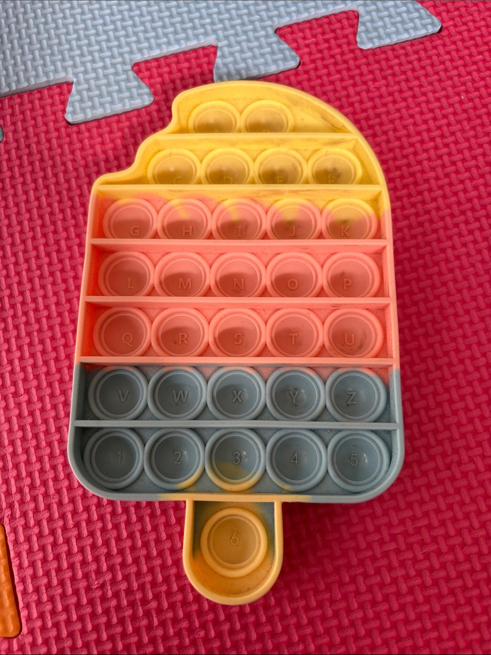 Popsicle-Shaped Bubble Popper Fidget Toy in Yellow, Coral & Gray
